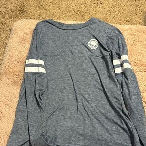 Long Sleeve Grey Shirt with Large design on back. Size Medium